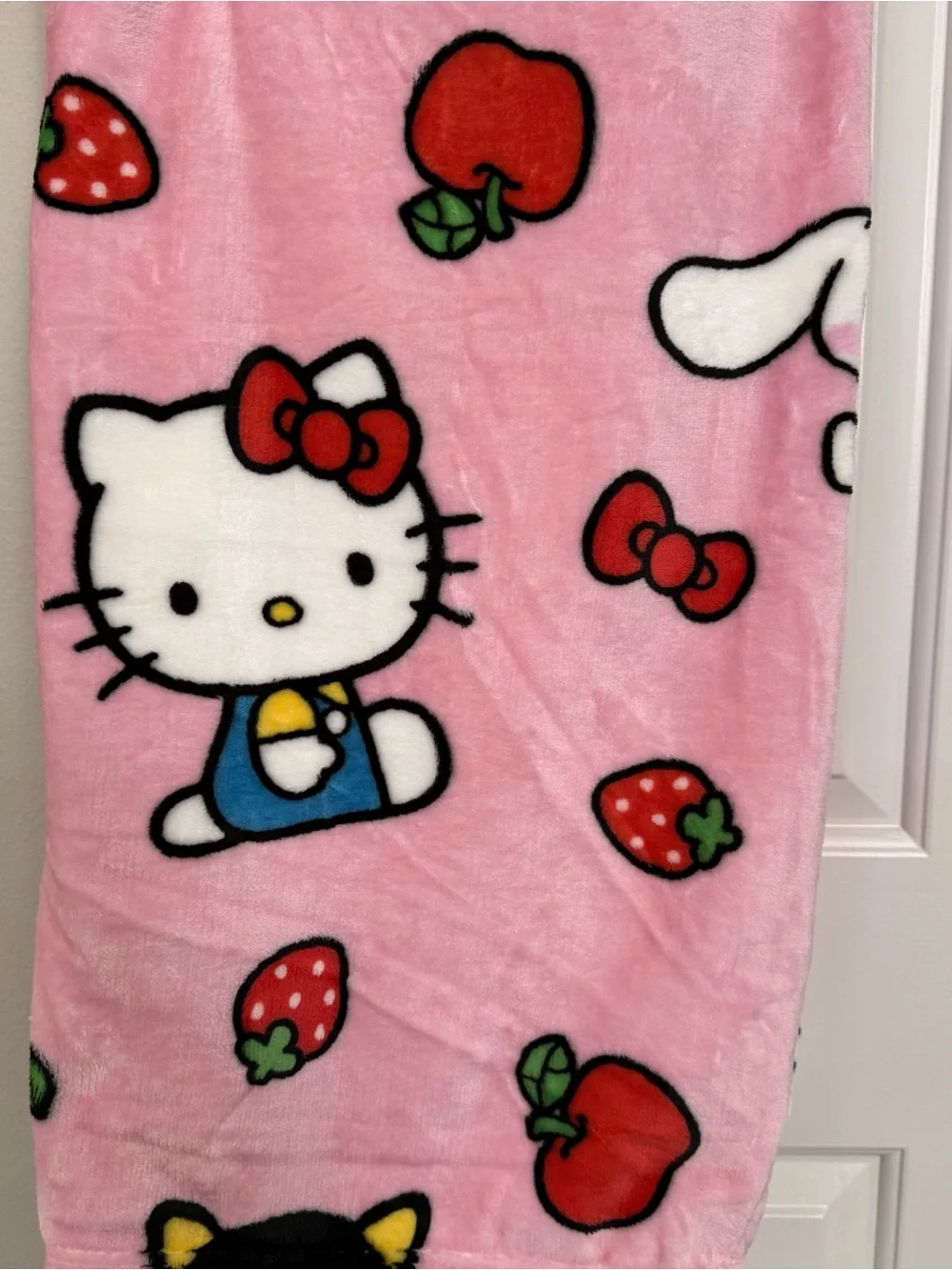 Hello Kitty Pink Plush Throw Blanket with Red Fruit & Bow Accents